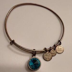 Alex and Ani Gold Bracelet with Blue Charm